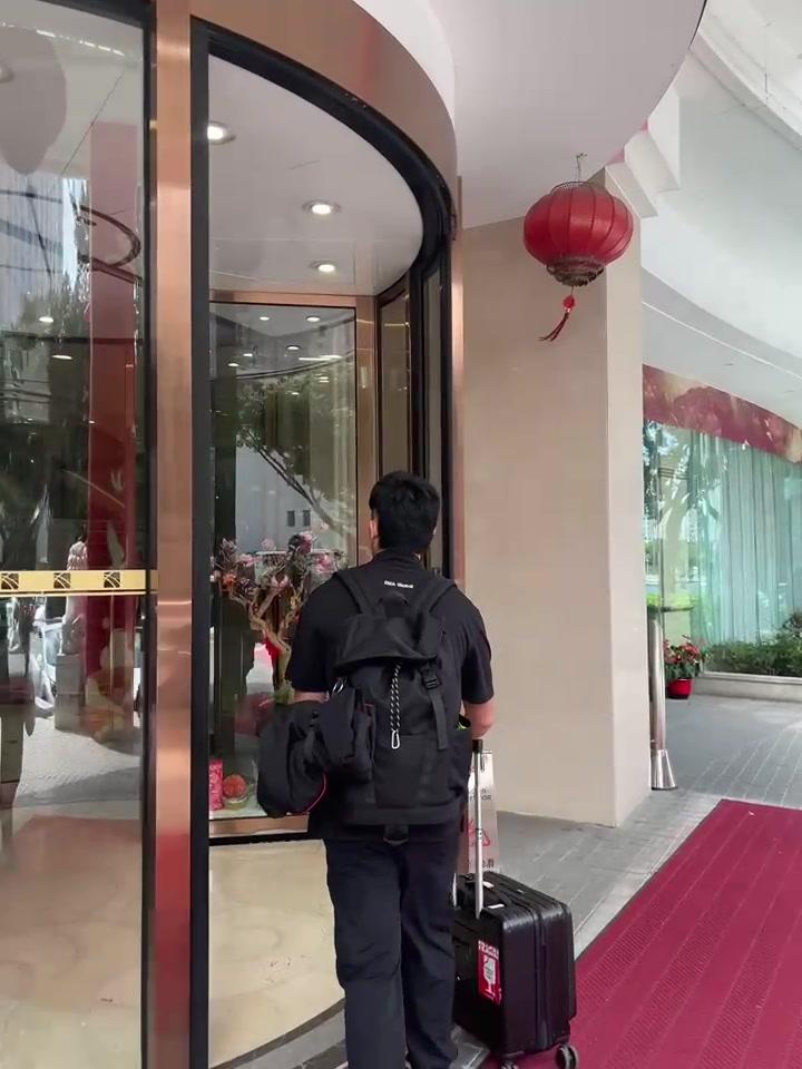 EMA Global medical escort arriving on mission with branded uniform and medical luggage