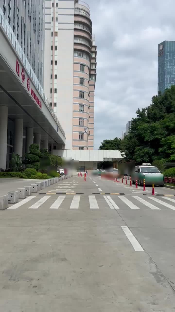 Hospital exterior and ambulance bay at the start of the medical transfer